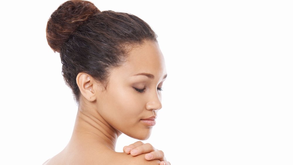 neck lift patient model with hair in a bun