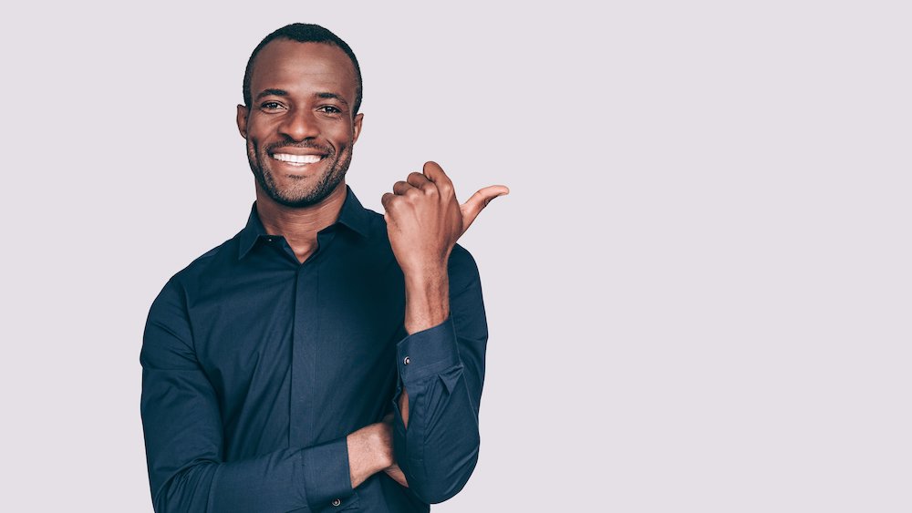 ethnic rhinoplasty patient model in a blue shirt