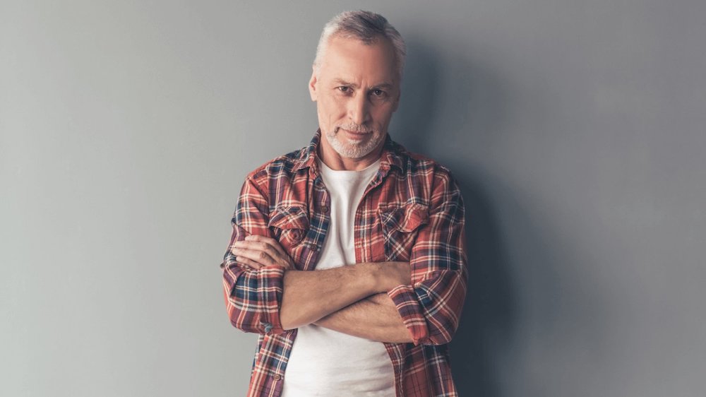 Man standing in red flannel shirt