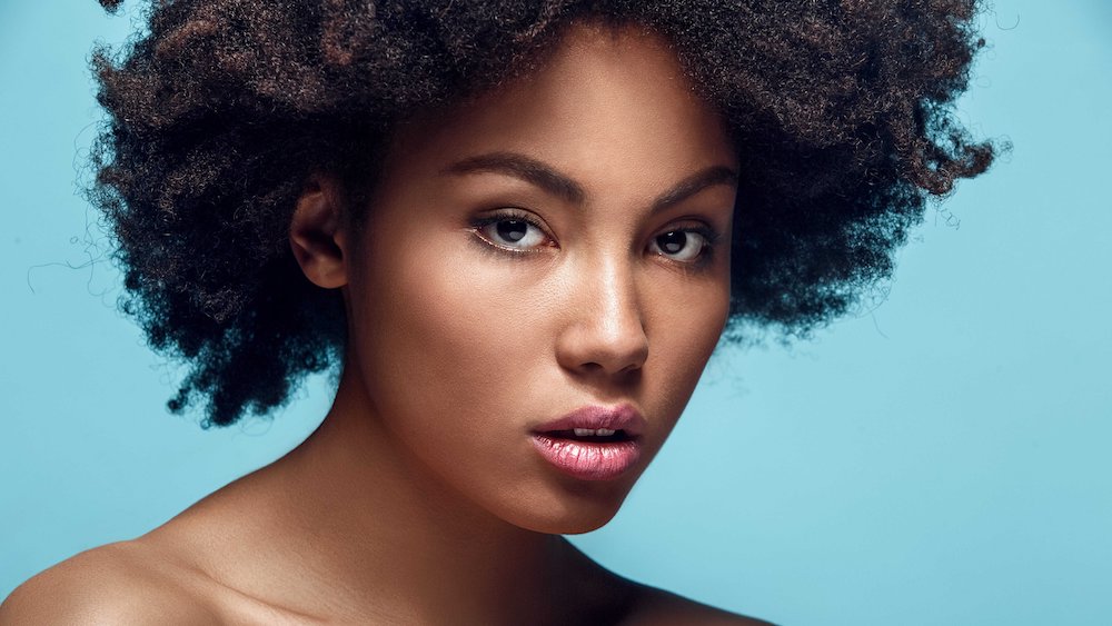Woman with afro close up