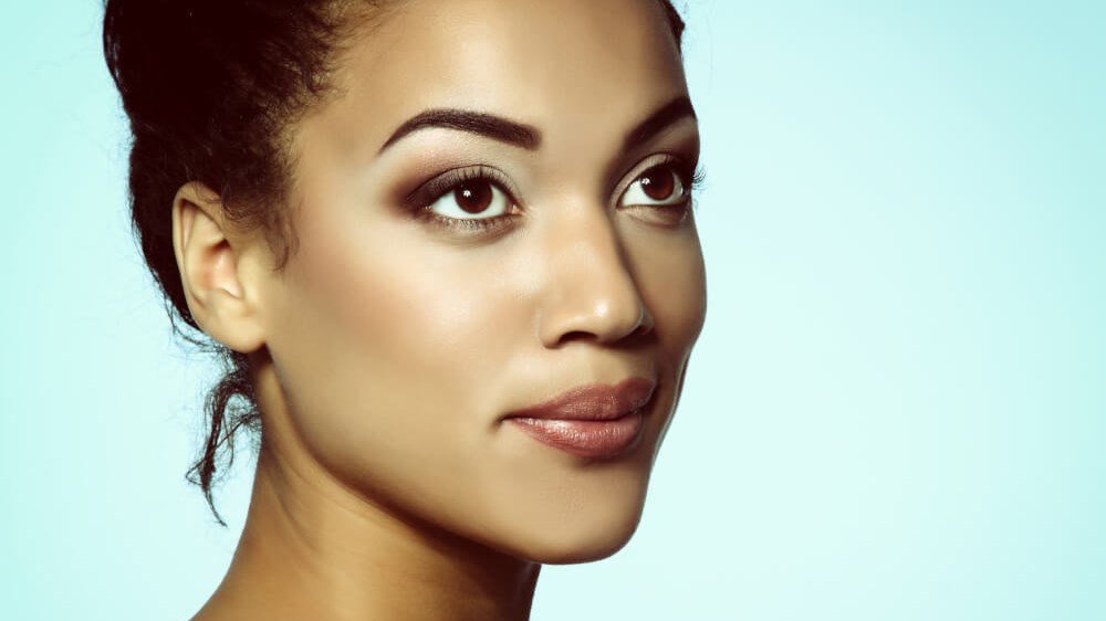 Artistic close up photo of a woman with brown eyes