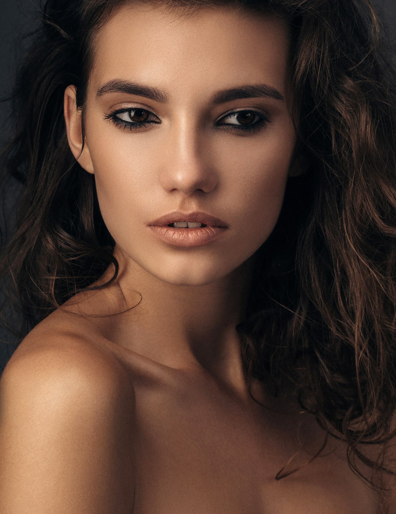 neck lift patient model with long brown hair